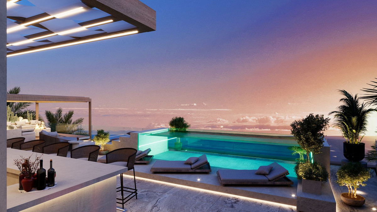 Rooftop pool at sunset — Costa de la Luz